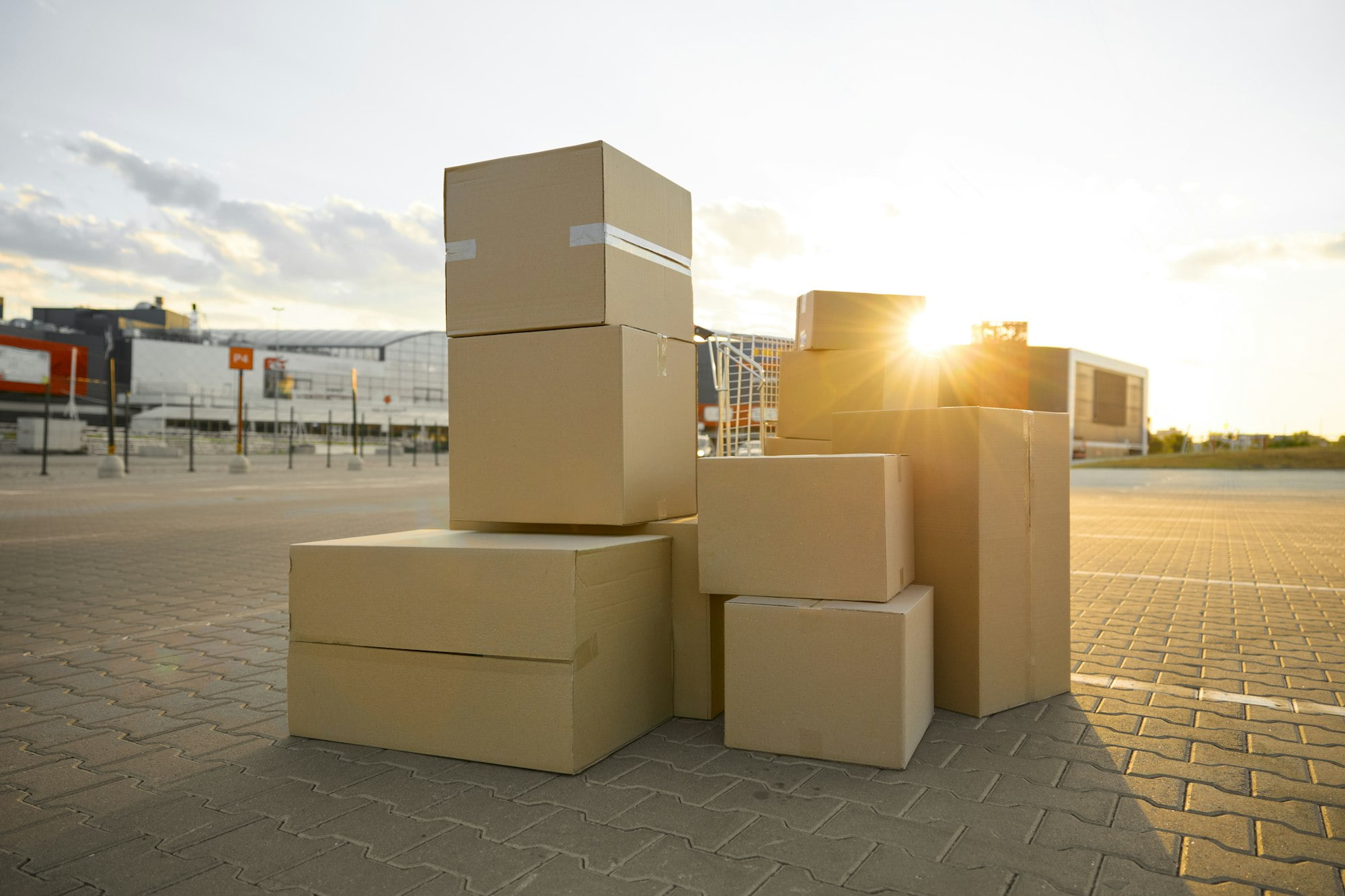 Parcel boxes stack on street city waiting for house moving service